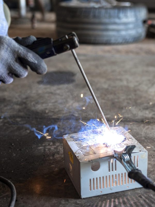 male-mechanic-working-his-workshop